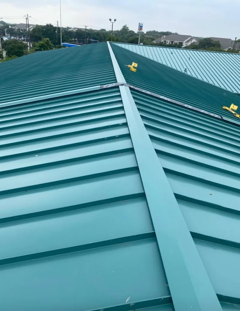 Green commercial metal roof ridge and valley for Metal Roof Repair in El Rio